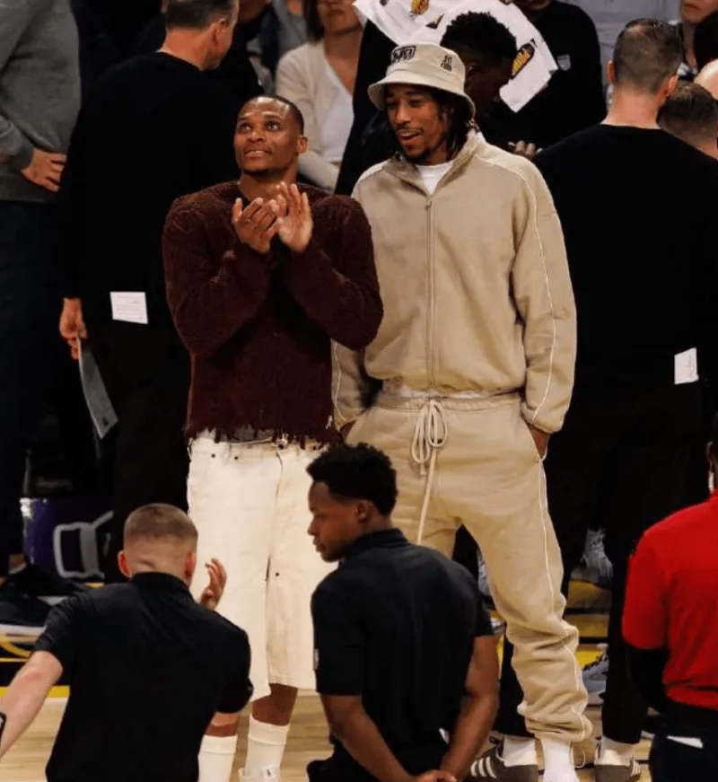 Westbrook posted a photo of himself signing autographs for a young fan on social media with the caption: Only love!