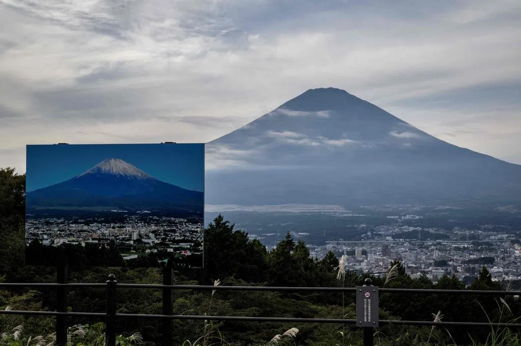 Japan's Mount Fuji sees its first snowfall 21 days later than usual