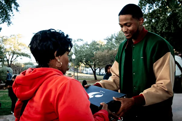 Helping others is a joy! The Spurs' official media outlet showcased De'Aaron Fox donating 50 pairs of shoes to a community pickup game.