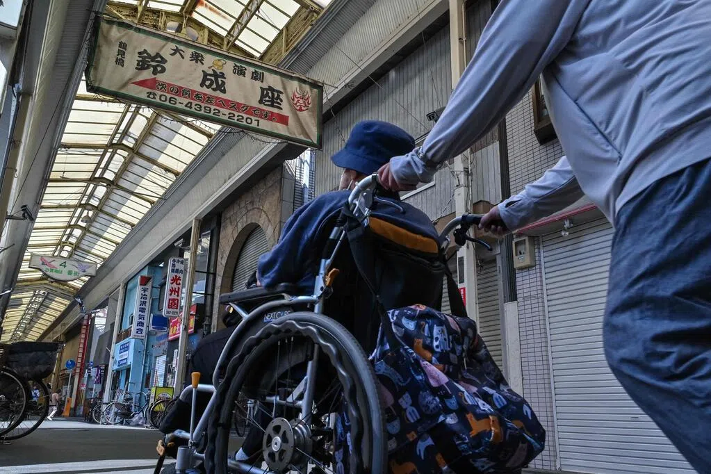 Japanese nursing homes hire muscular male caregivers to address staff shortages in the nursing industry.