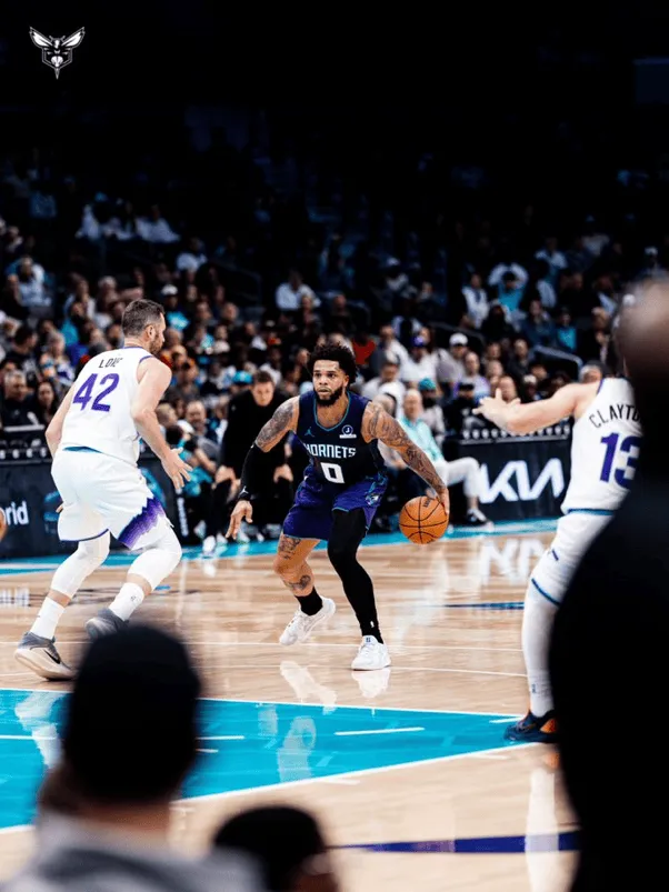 Defend Home Court! Hornets' official media posted player photos from the game with the caption: Victory Monday