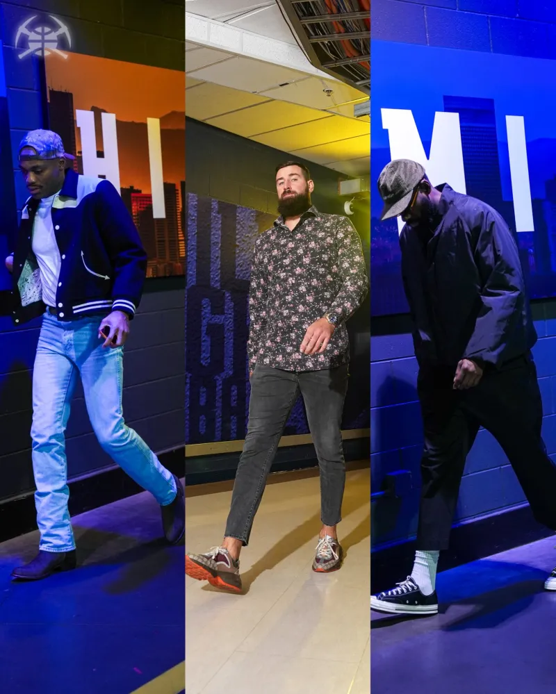 The Nuggets players entered their home arena, with Jokic standing out in a suit.