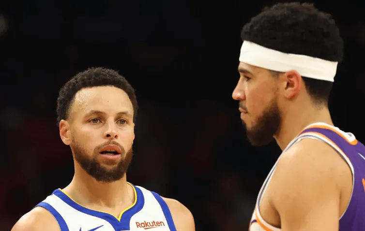 Booker: I haven't discussed switching teams with Curry we will remain with our respective teams.