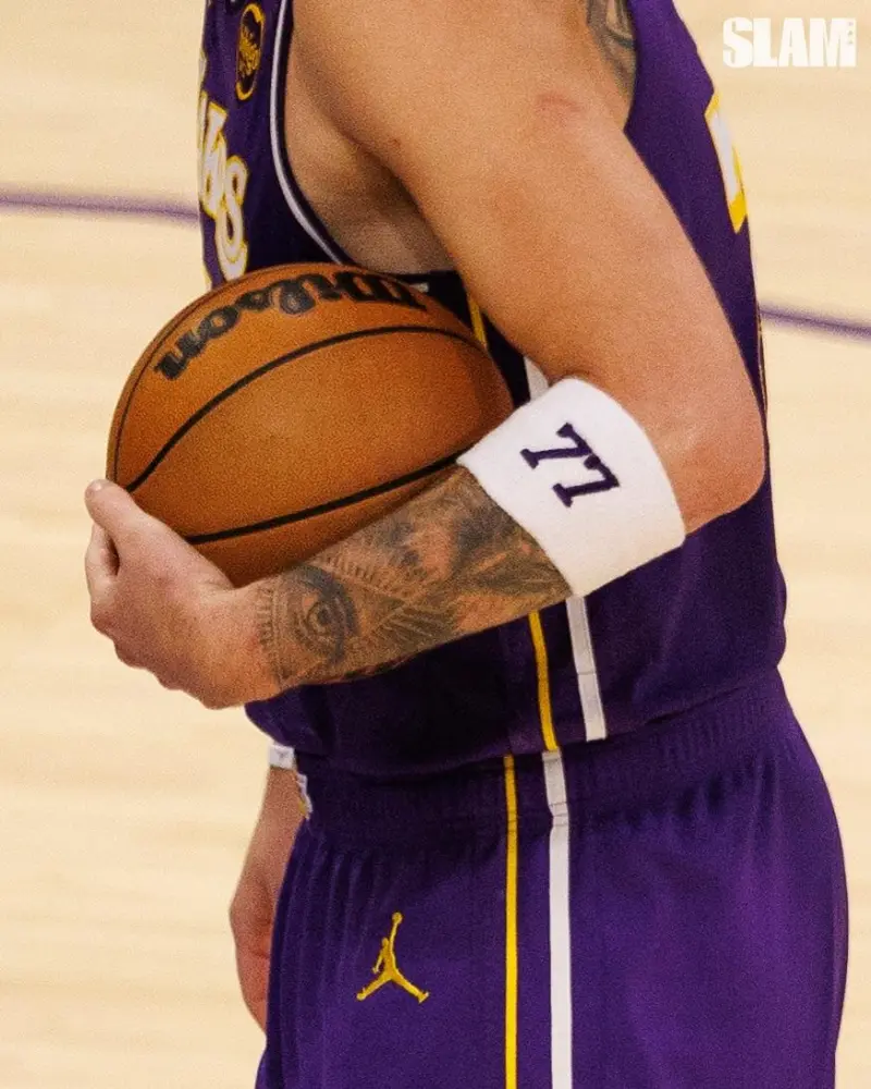 Slam officially shared photos of Doncic and Wimbledon on the court.
