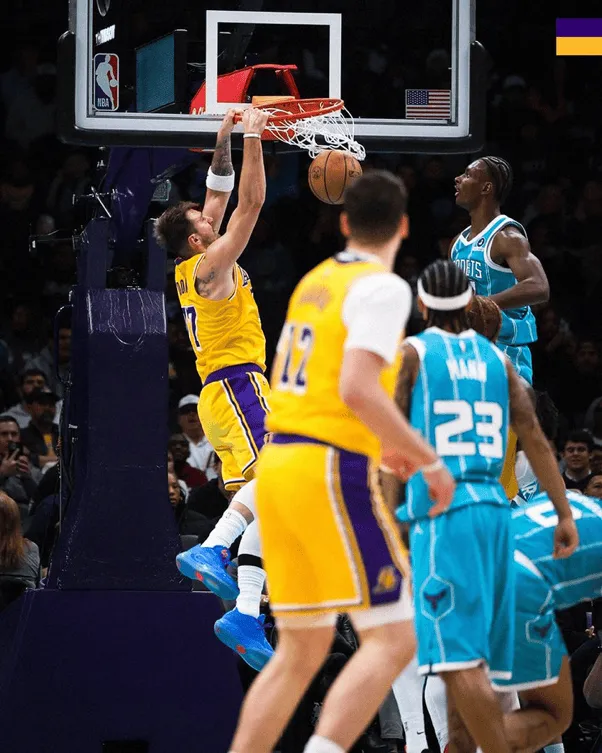 Luka Doncic slams a two-handed dunk in the paint