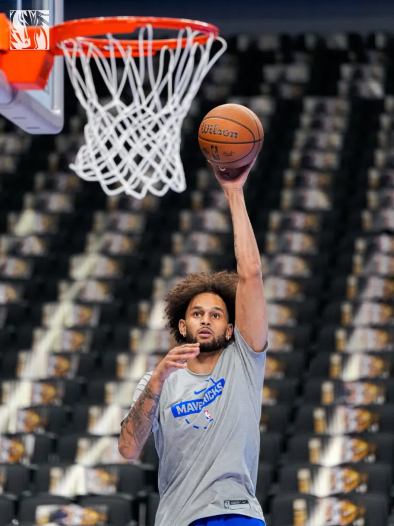 Welcome back! Mavericks' social media posts show Lifeley warming up before the game.