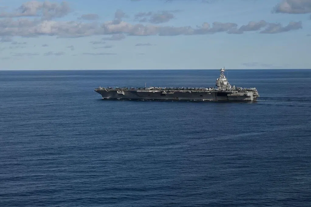 The largest U.S. aircraft carrier arrives in the Caribbean to intensify anti-drug operations.