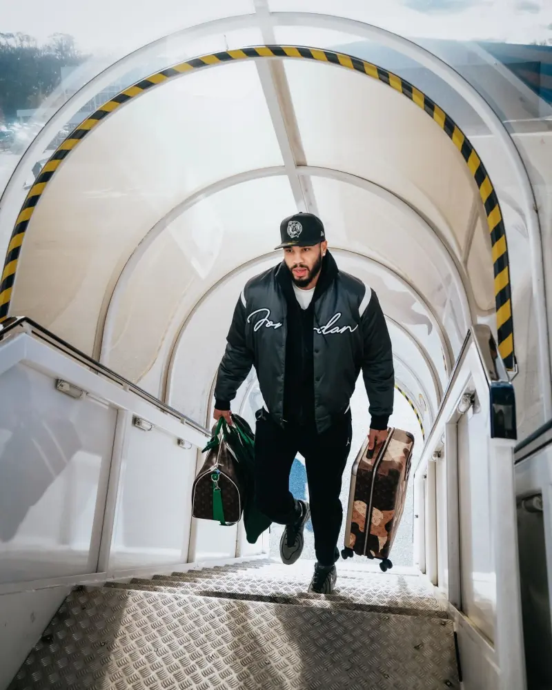 The Celtics' official account posted photos of the players boarding the plane.
