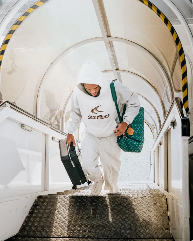 The Celtics' official account posted photos of the players boarding the plane.