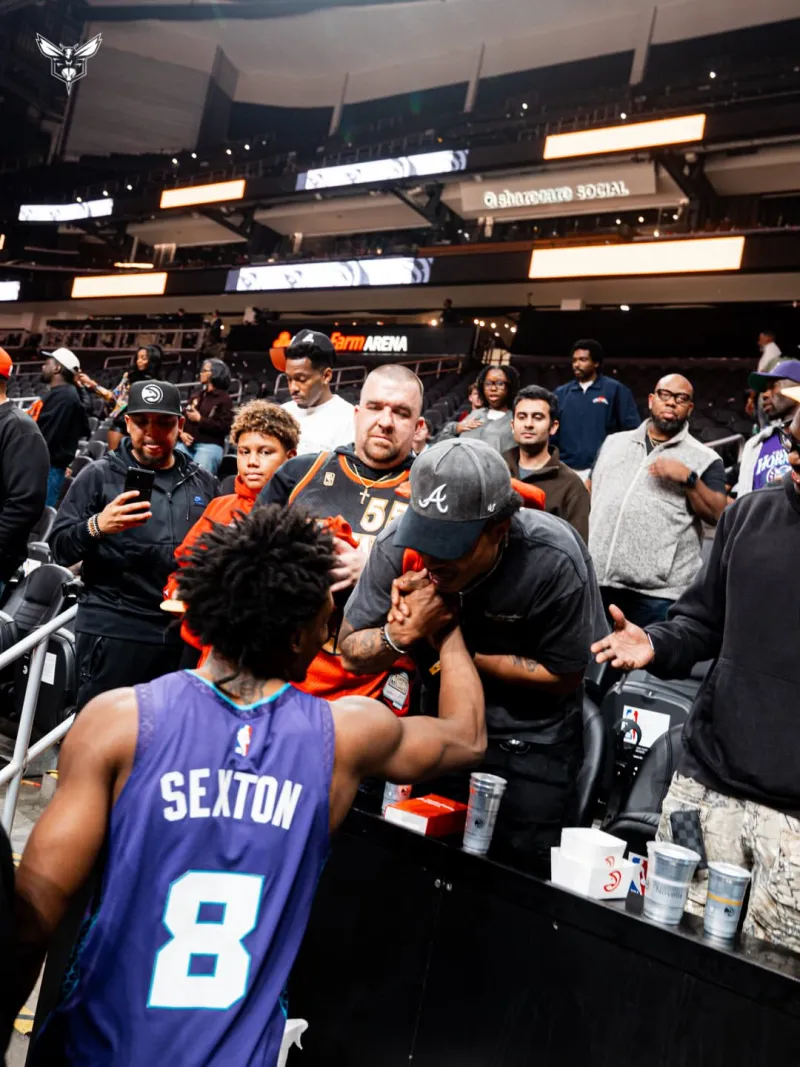 The Hornets shared photos of Colin and Sean with family and friends on social media.