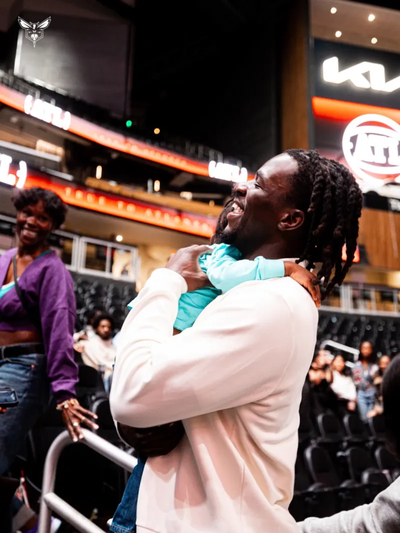 The Hornets shared photos of Colin and Sean with family and friends on social media.