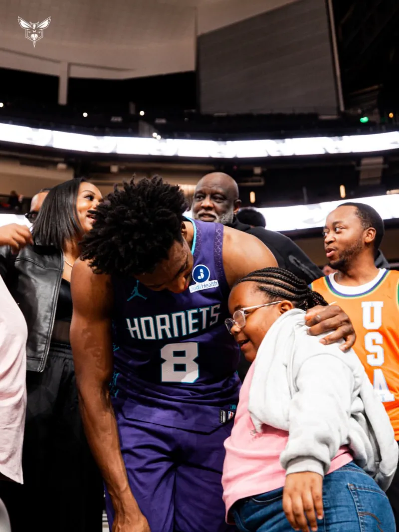 The Hornets shared photos of Colin and Sean with family and friends on social media.
