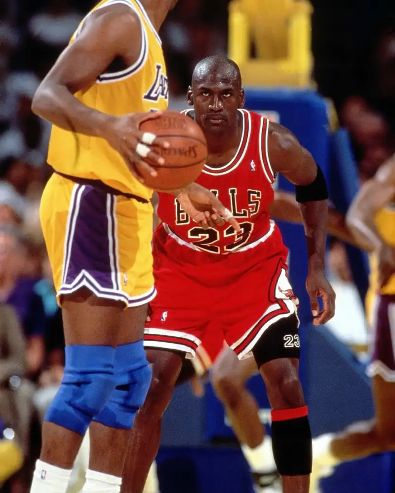 Slam's official account shared a defensive moment featuring Jordan: 9 All-Defensive Team selections, 3 steals titles, and 1 Defensive Player of the Year award.