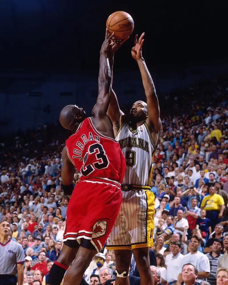 Slam's official account shared a defensive moment featuring Jordan: 9 All-Defensive Team selections, 3 steals titles, and 1 Defensive Player of the Year award.