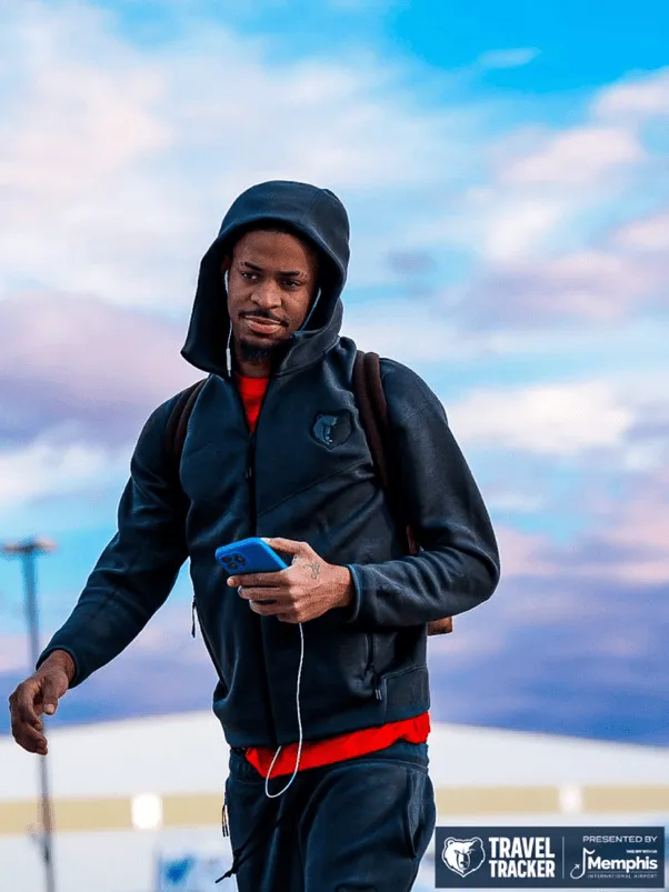 Grizzlies post photos of players' outfits for boarding the plane.