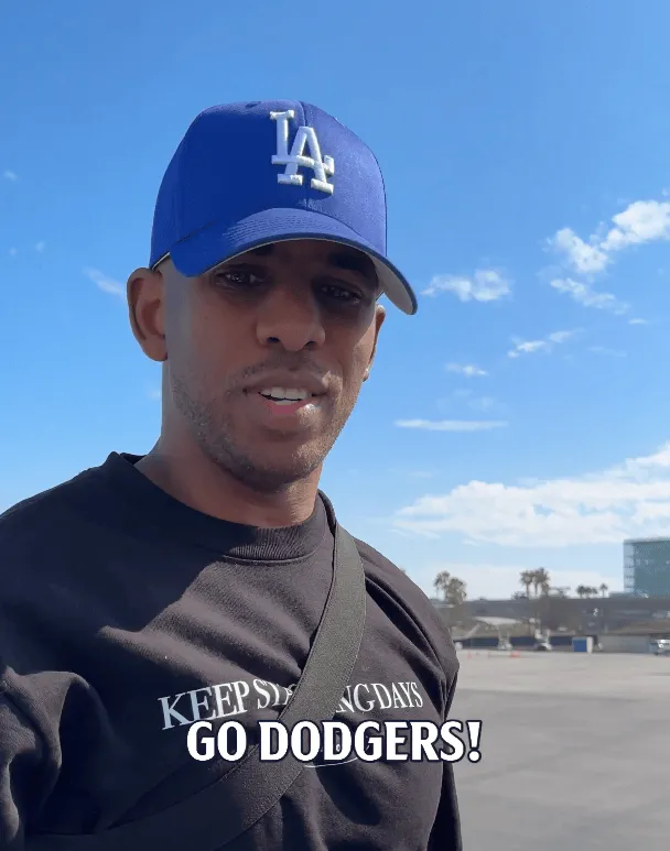 The Clippers' official account posted a photo of Chris Paul cheering for the Dodgers: Congratulations to the Los Angeles Dodgers!