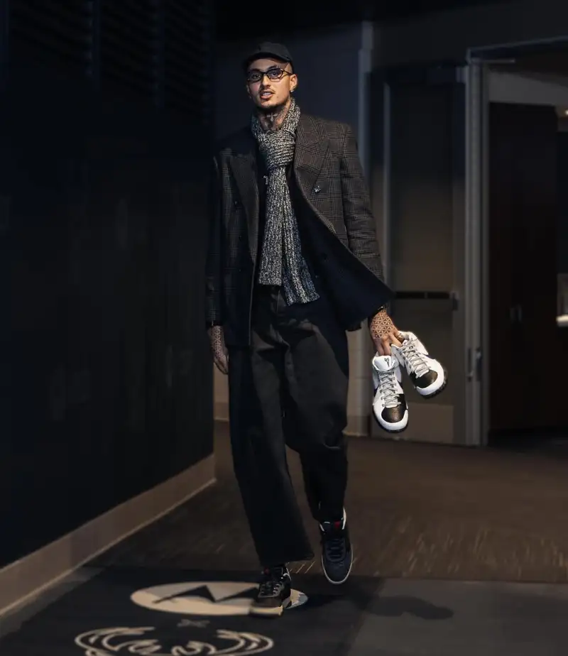 Kyle Kuzma's dashing style! He posts a photo on Instagram the Bucks are currently fifth in the Eastern Conference.